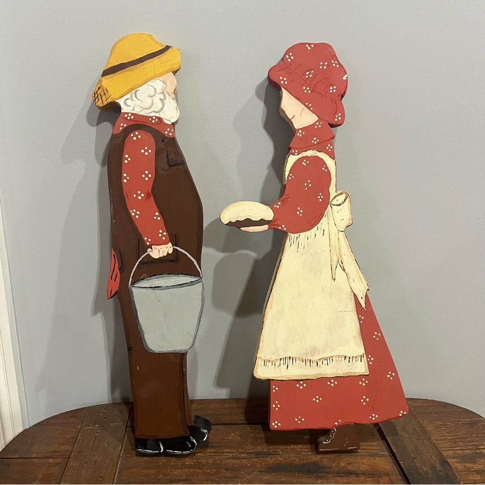 Handpainted vintage wood cutouts of Primitive Milkmaid and Farmer wall plaques